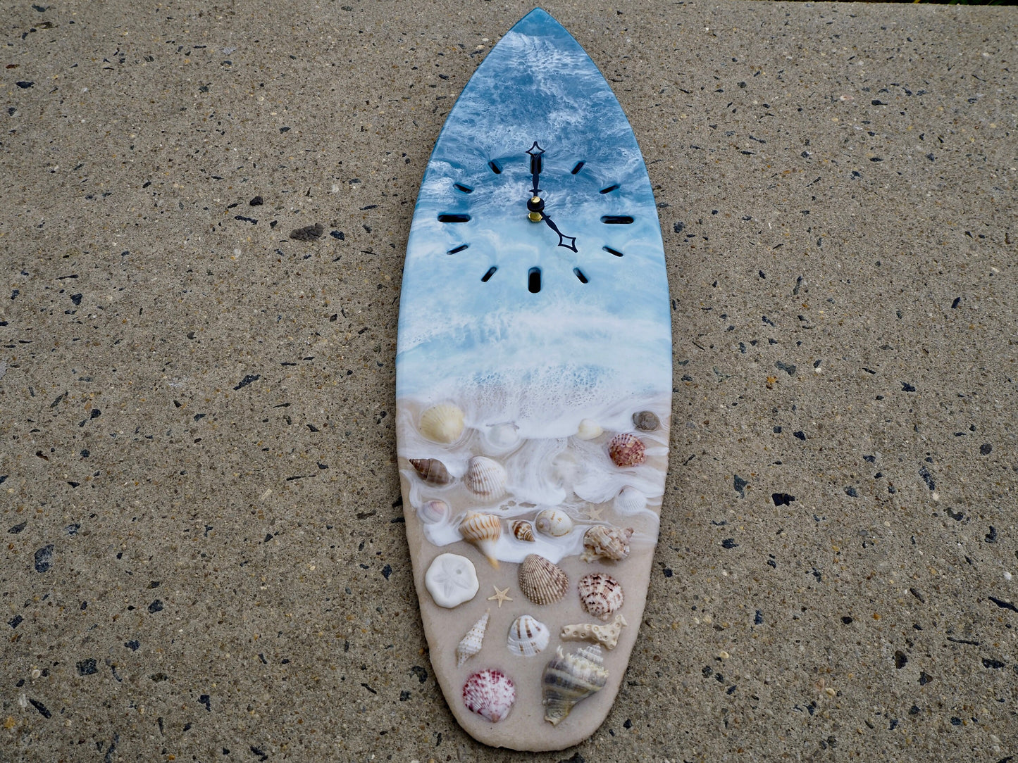 Handmade 24 Inch Surfboard Wall Clock Adorned with Real Sand and Shells Eye Catching Coastal Home Decor Piece Ideal for Beach Lovers, Surf Enthusiasts, and Nautical Themed Interiors